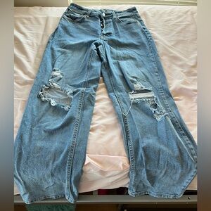 Distressed Blue Denim Jeans